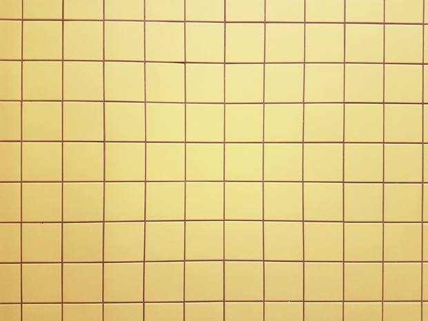 Azulejo amarelo quadriculado